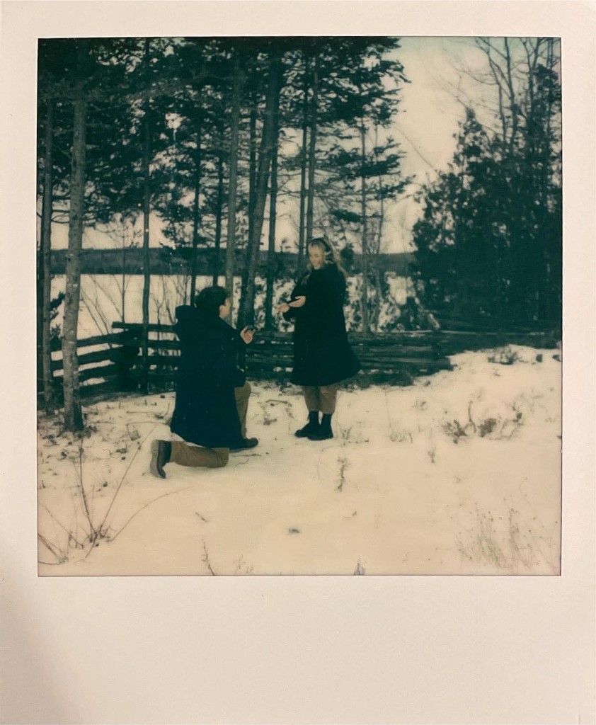 Adam on one knee, asking Misty
